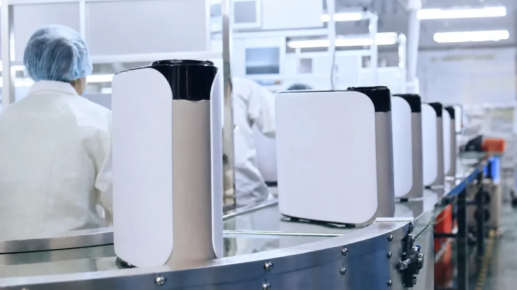 Debranded water purification units moving through a manufacturing line