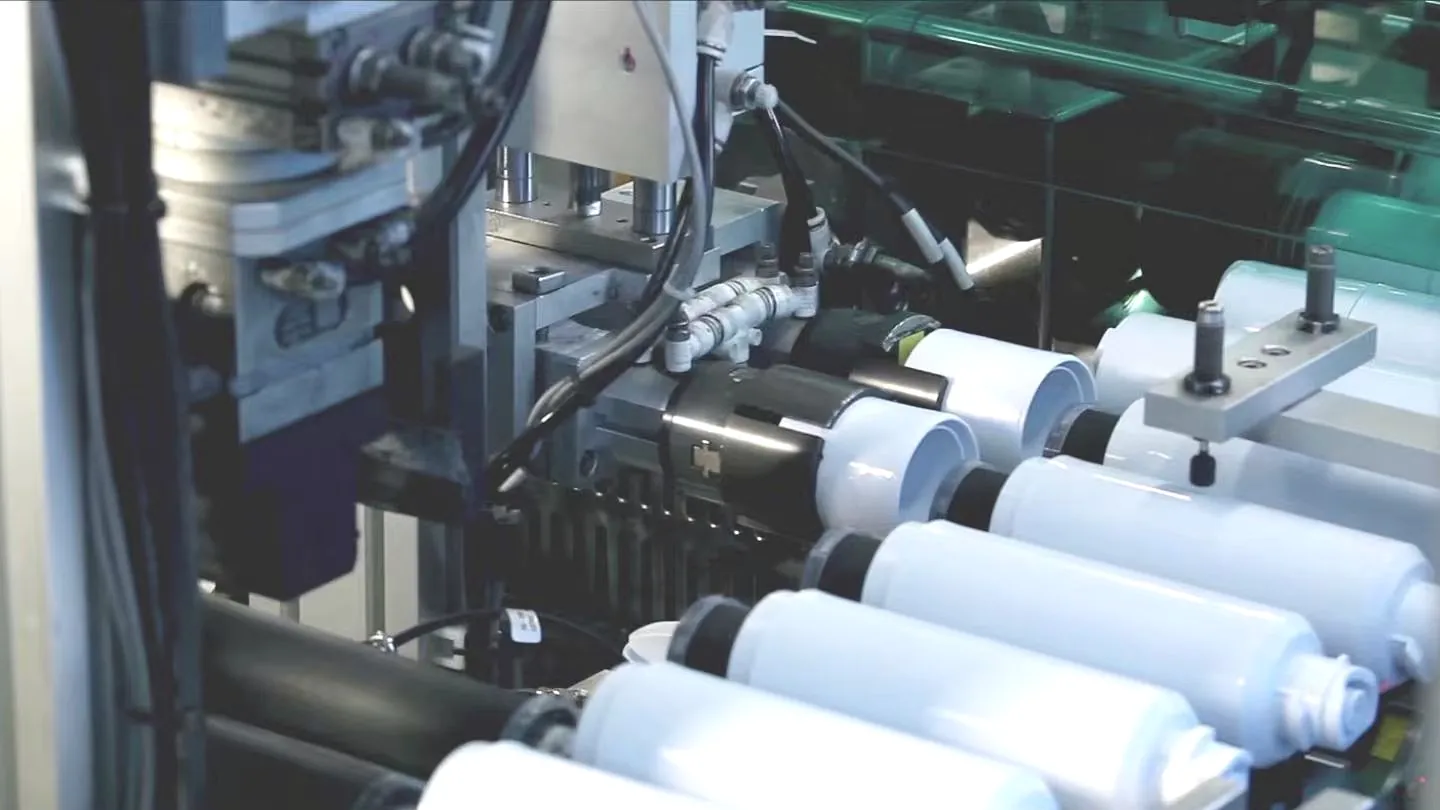 Production line equipment handling cylindrical filter components