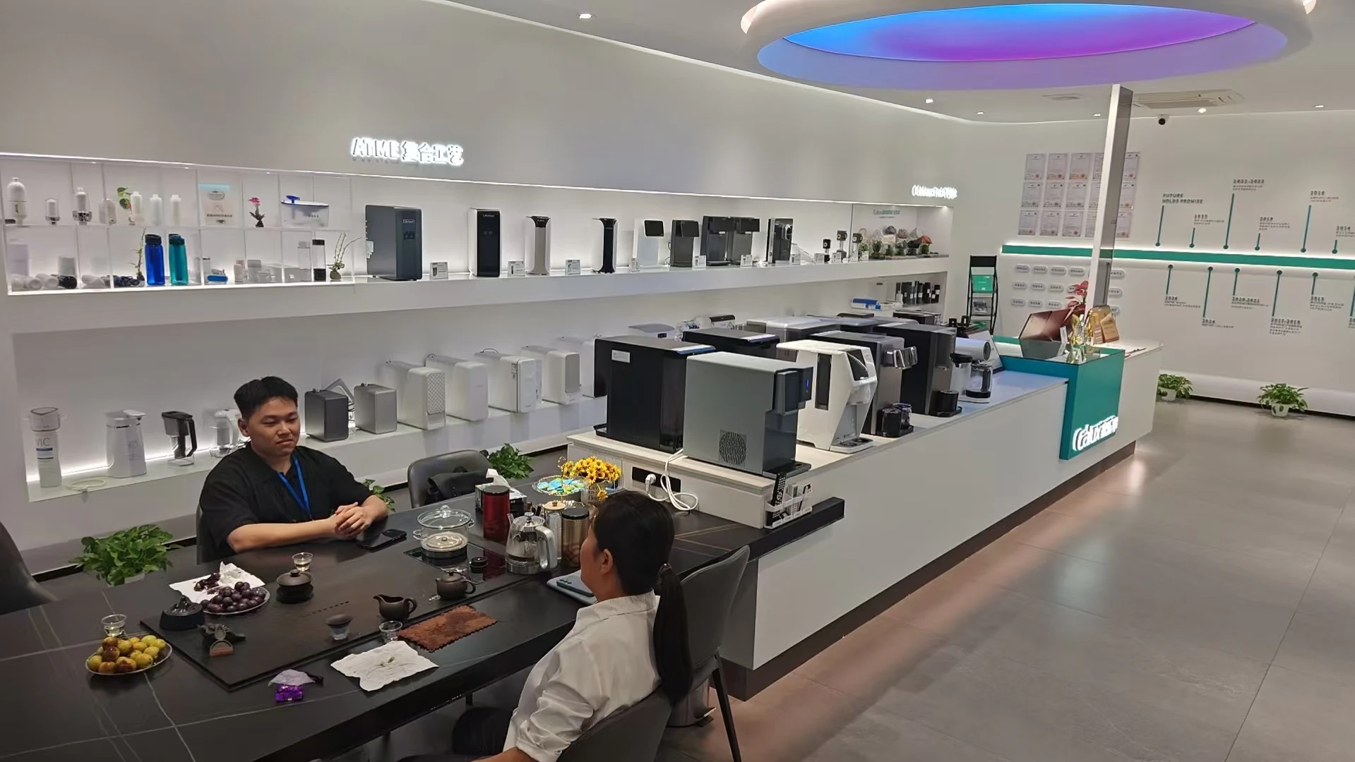 Showroom consultation scene with water product displays